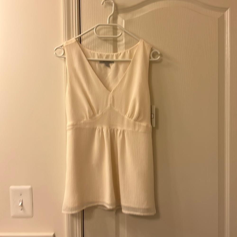 off white/cream sleeveless blouse/tank. tie